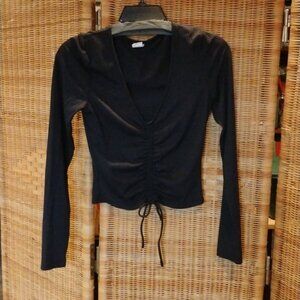 Like New Cond, Black top, no snags, Cinch front. Long sleeves. Women XS